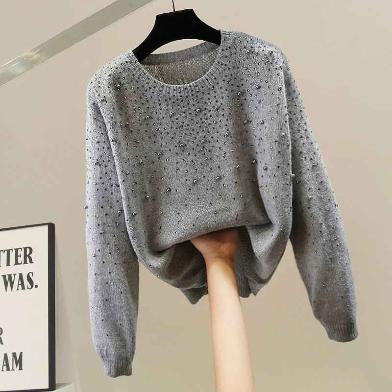 Модный женский вязаный свитер с бисерным декором, свободного кроя, с длинными рукавами и круглым вырезом, с изысканным дизайном и тщательной проработкой деталей.
Модный женский вязаный свитер с бисерным декором, свободного кроя, с длинными рукавами и круглым вырезом, с изысканным дизайном и тщательной проработкой деталей.