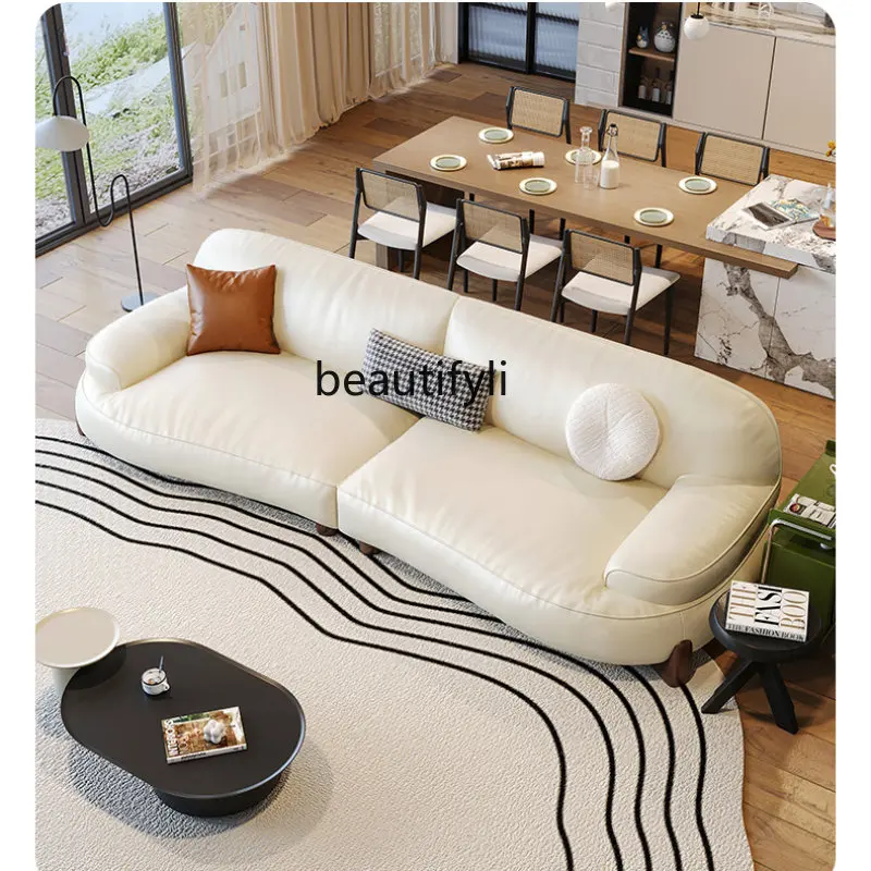 Cream Style Simple Living Room Leather Sofa Creative Arc Light Luxury Minimalist Sofa
Cream Style Simple Living Room Leather Sofa Creative Arc Light Luxury Minimalist Sofa