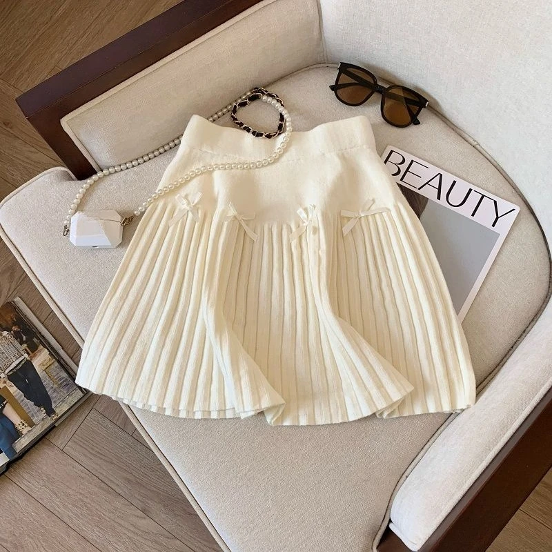 Французский стиль, темперамент, трехмерный бант, трикотажная плиссированная юбка трапециевидной формы, черные корейские модные мини-юбки Jupe Faldas
Французский стиль, темперамент, трехмерный бант, трикотажная плиссированная юбка трапециевидной формы, черные корейские модные мини-юбки Jupe Faldas