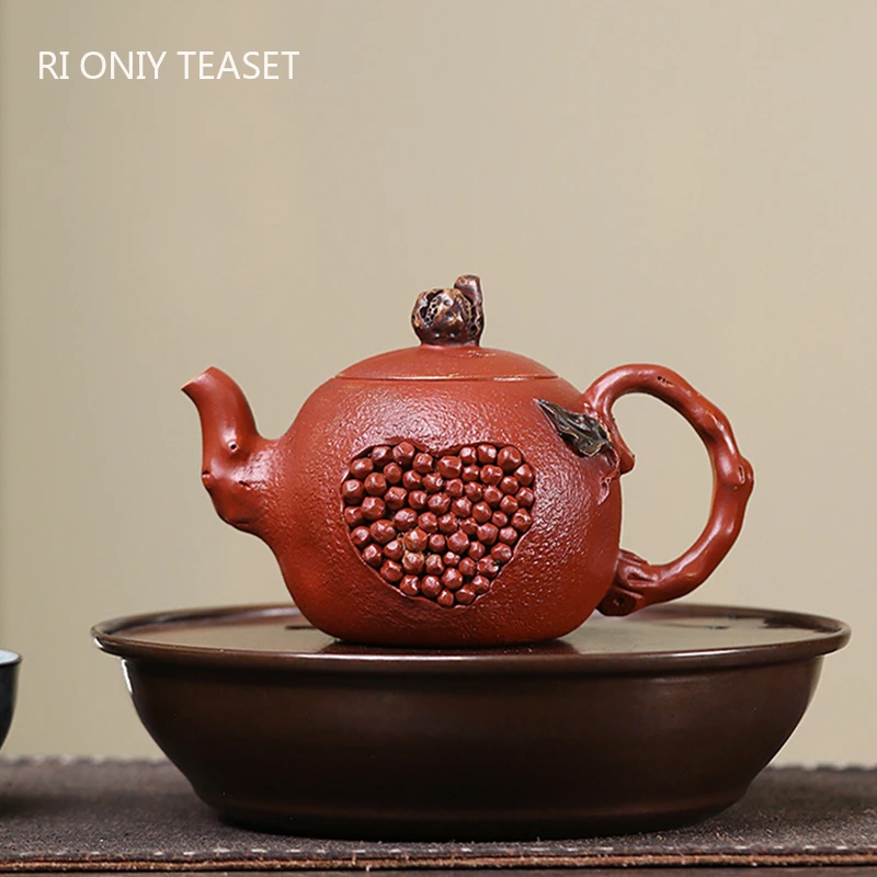 260ml Chinese Yixing Purple Clay Teapots Creative Pomegranate Shape Handmade Tea Pot Beauty Tea Infuser Kettle Zisha Tea Set
260ml Chinese Yixing Purple Clay Teapots Creative Pomegranate Shape Handmade Tea Pot Beauty Tea Infuser Kettle Zisha Tea Set