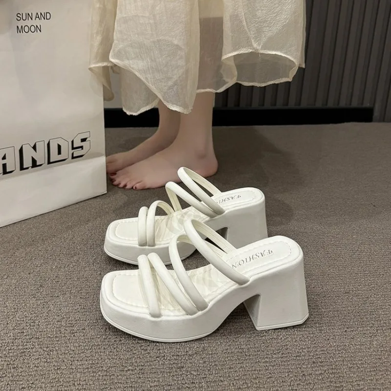 Fashionable High-Heeled Sandals Women's Summer Thin Strap Outer Wear Thick Bottom Drag Shoes Southeast Asia Beach Sandals
Fashionable High-Heeled Sandals Women's Summer Thin Strap Outer Wear Thick Bottom Drag Shoes Southeast Asia Beach Sandals