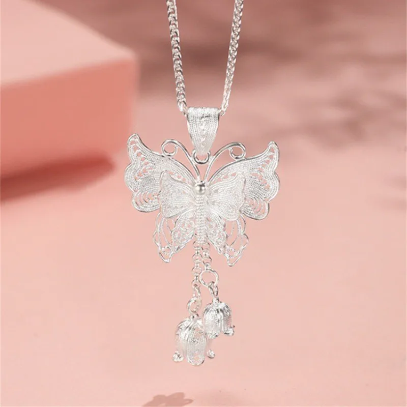 Серебряное ожерелье с бахромой в виде бабочки и орхидеи, женское новое китайское темпераментное универсальное модное ожерелье с ключицей
Серебряное ожерелье с бахромой в виде бабочки и орхидеи, женское новое китайское темпераментное универсальное модное ожерелье с ключицей