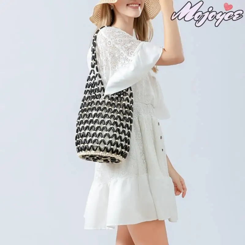 Women Hollow-out Shoulder Bags Woven Hand Bag Wooden Bead Bucket Bags Beach Top-Handle Bags Summer Netted Canvas Tote Handbag
Women Hollow-out Shoulder Bags Woven Hand Bag Wooden Bead Bucket Bags Beach Top-Handle Bags Summer Netted Canvas Tote Handbag