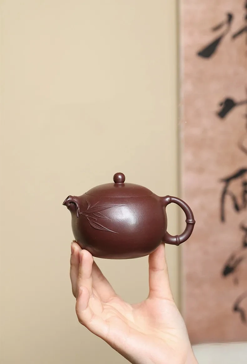 180ml Chinese Yixing Purple Clay Teapot Beauty Tea Infuser Kettle Handmade Bamboo Leaf Xishi Tea Pot Household Zisha Tea Set
180ml Chinese Yixing Purple Clay Teapot Beauty Tea Infuser Kettle Handmade Bamboo Leaf Xishi Tea Pot Household Zisha Tea Set
