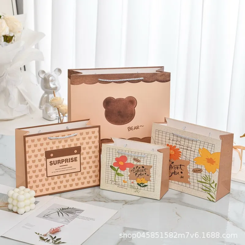 Custom. Children's Day Cartoon Bag Cute Bear Paper Bag Flower Pattern Handbag Children's Clothing Stores Paper Packaging Ba
Custom. Children's Day Cartoon Bag Cute Bear Paper Bag Flower Pattern Handbag Children's Clothing Stores Paper Packaging Ba