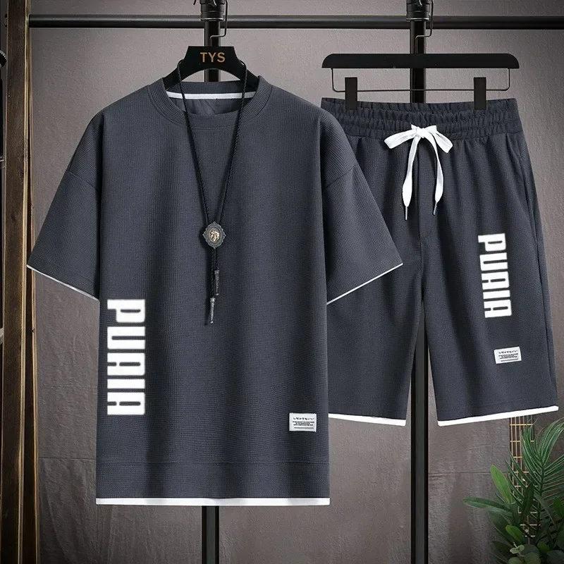 2026 New Men's T-shirt and Shorts Set 2-in-1 Summer Breathable Casual T-shirt Running Fashion Element Printed Men's Sports Set
2026 New Men's T-shirt and Shorts Set 2-in-1 Summer Breathable Casual T-shirt Running Fashion Element Printed Men's Sports Set