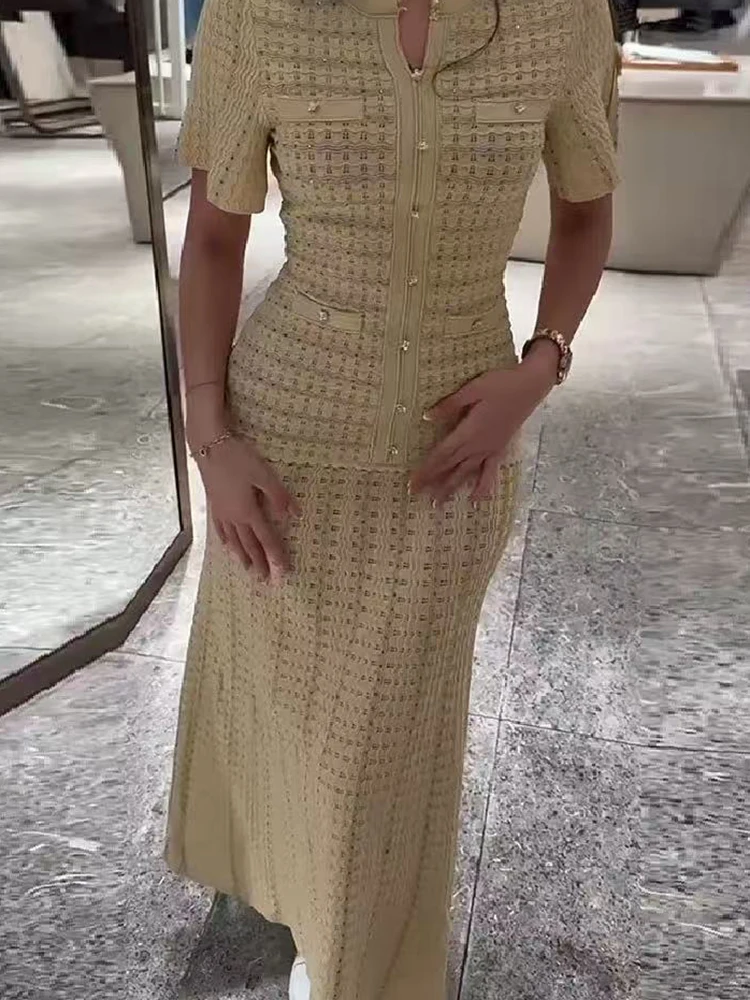 Women Elegant O-neck Hollow-out Short Sleeve Slim Robe Ladies 2026 Spring New Fashion Beige Temperament Knit Long Dress
Women Elegant O-neck Hollow-out Short Sleeve Slim Robe Ladies 2026 Spring New Fashion Beige Temperament Knit Long Dress