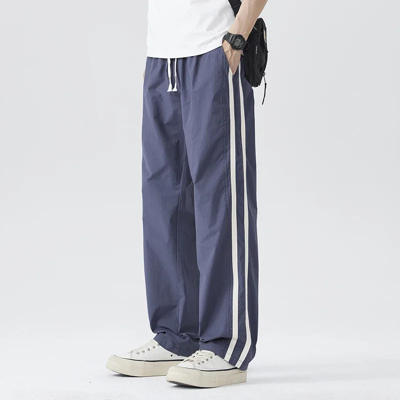 Men Streetwear Fashion Loose Casual Sport Pant Joggers Sweatpants Techwear Trousers Spring Summer Lightweight Track Pant
Men Streetwear Fashion Loose Casual Sport Pant Joggers Sweatpants Techwear Trousers Spring Summer Lightweight Track Pant