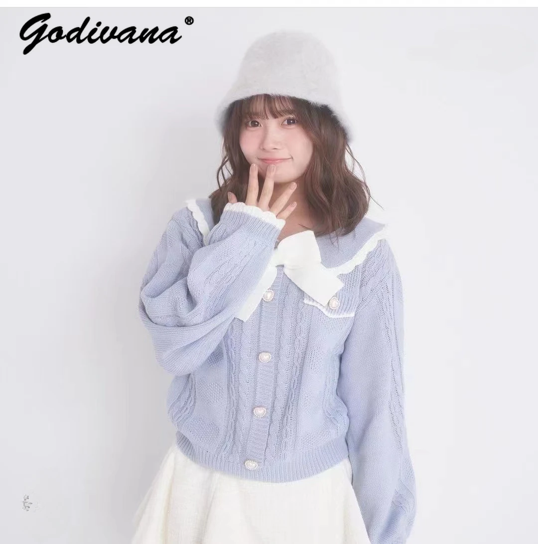 Autumn and Winter New Japanese Sweet Girl Bow Sweater Knitwear Women's Single-Breasted Short Sweater Cardigan Coat
Autumn and Winter New Japanese Sweet Girl Bow Sweater Knitwear Women's Single-Breasted Short Sweater Cardigan Coat