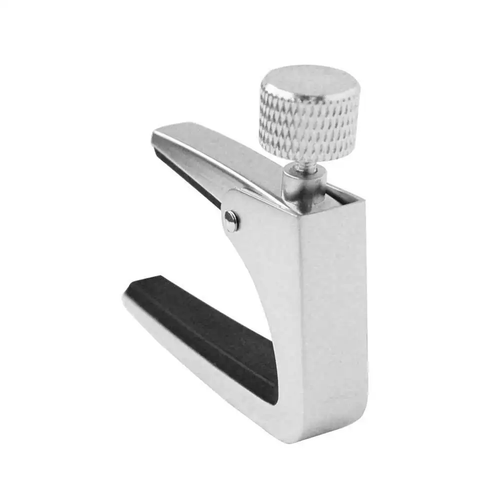 Быстросменный гитарный каподастр Ac-11 — работа одной рукой с мягкой силиконовой подушкой, без повреждений струн
Быстросменный гитарный каподастр Ac-11 — работа одной рукой с мягкой силиконовой подушкой, без повреждений струн