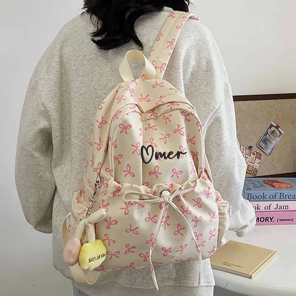 Fashionable Bow Name Custom Student Campus Versatile Backpack, Large Capacity Computer Bag, Personalized Outdoor Travel Handbag
Fashionable Bow Name Custom Student Campus Versatile Backpack, Large Capacity Computer Bag, Personalized Outdoor Travel Handbag