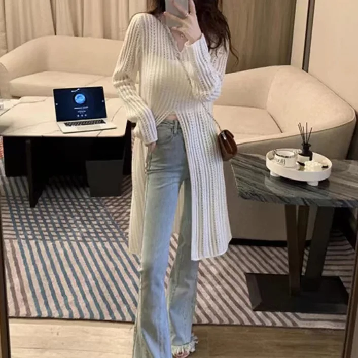 V-neck hollow knitted sweater top for women's spring/summer 2025 new item split mid length sun protection cover shirt
V-neck hollow knitted sweater top for women's spring/summer 2025 new item split mid length sun protection cover shirt