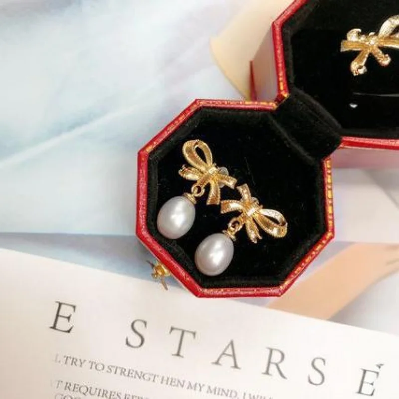 Zhuji Freshwater Pearl Bowknot Simple Elegant Internet Celebrity Jewelry Exquisite Small Oval Bead Stud Earrings Wholes
Zhuji Freshwater Pearl Bowknot Simple Elegant Internet Celebrity Jewelry Exquisite Small Oval Bead Stud Earrings Wholes