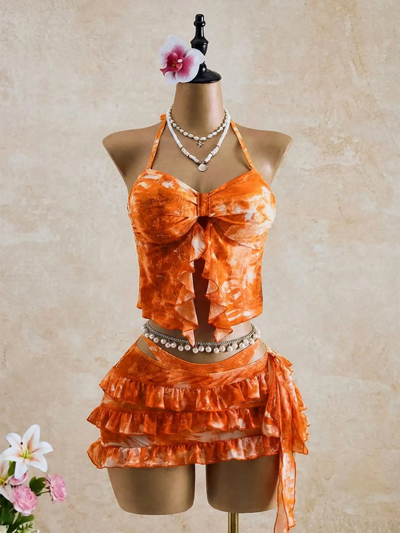 Orange Tie Dye Ruffled Halter Bikini Set With Skirt
Orange Tie Dye Ruffled Halter Bikini Set With Skirt