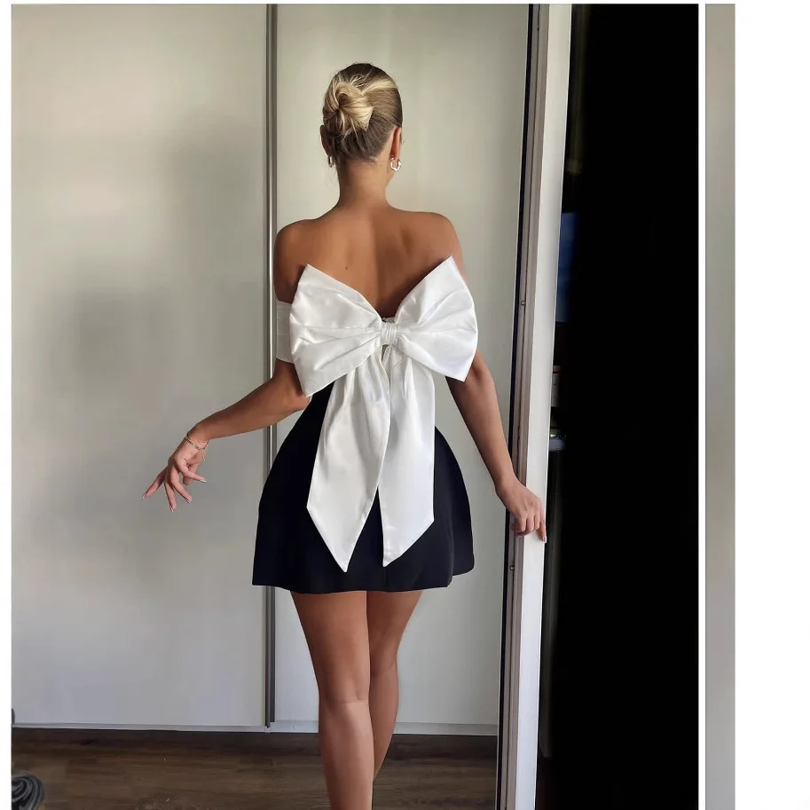 2025 Spring and Summer One-word Shoulder Black and White Contrasting Colors Waist A Pendulum Design Sense Bow Dress
2025 Spring and Summer One-word Shoulder Black and White Contrasting Colors Waist A Pendulum Design Sense Bow Dress