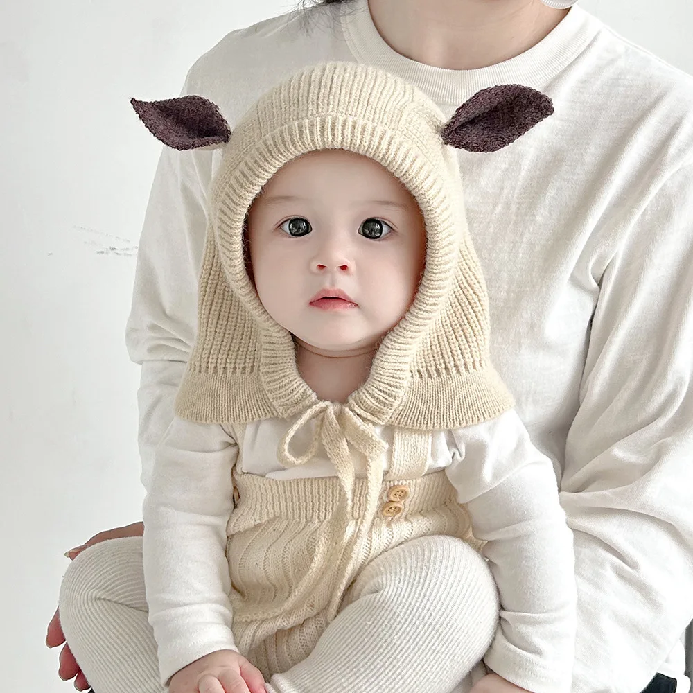 Зимняя теплая детская защитная шапка для ушей, Балаклава с мультяшными ушками, шейный платок для малышей, шерстяной вязаный головной убор, детская шапочка с капюшоном
Зимняя теплая детская защитная шапка для ушей, Балаклава с мультяшными ушками, шейный платок для малышей, шерстяной вязаный головной убор, детская шапочка с капюшоном