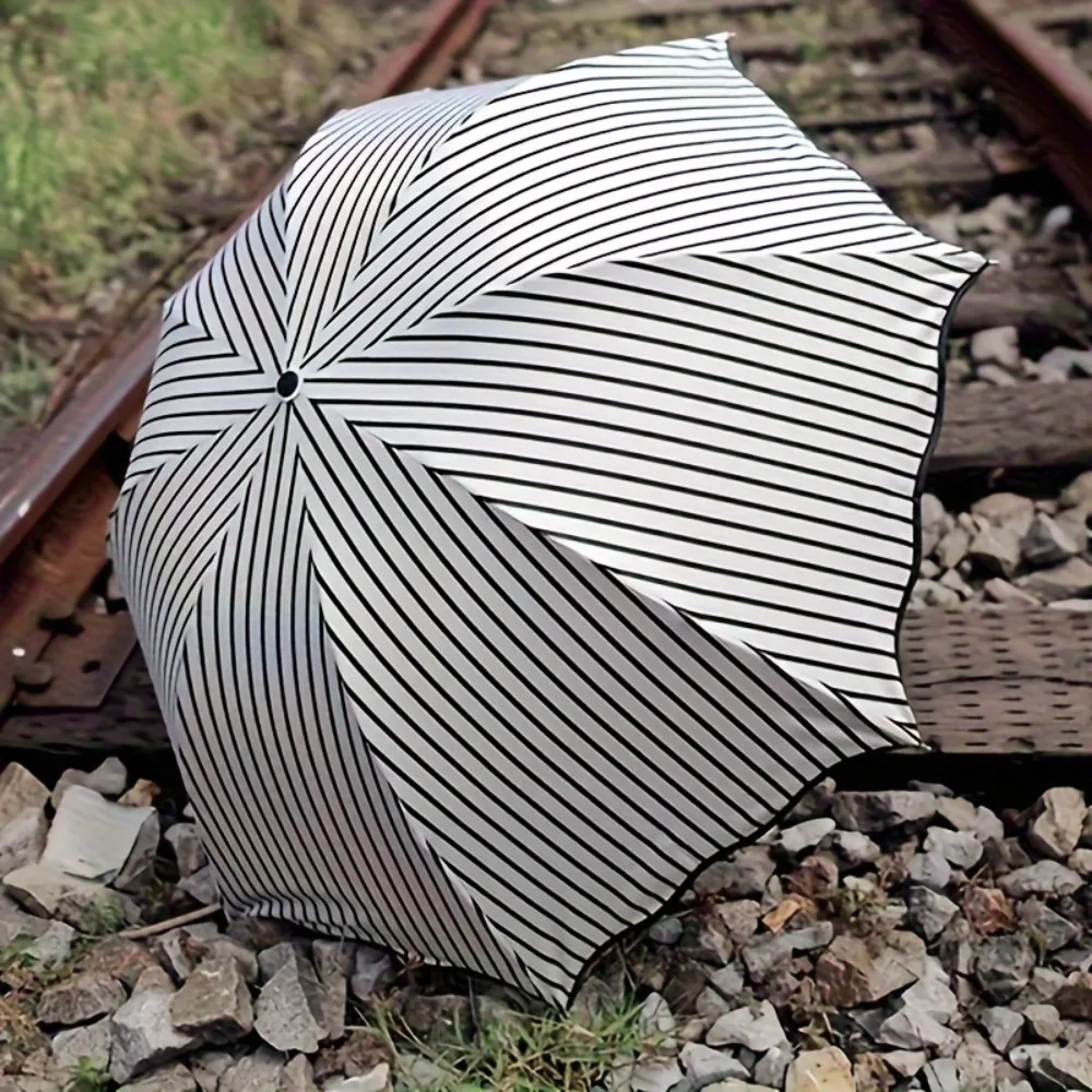 Sunscreen Umbrella Simple Striped Folding Dual-use Umbrella For Rain And Rain Small And Fresh Black Rubber Sun Umbrella
Sunscreen Umbrella Simple Striped Folding Dual-use Umbrella For Rain And Rain Small And Fresh Black Rubber Sun Umbrella