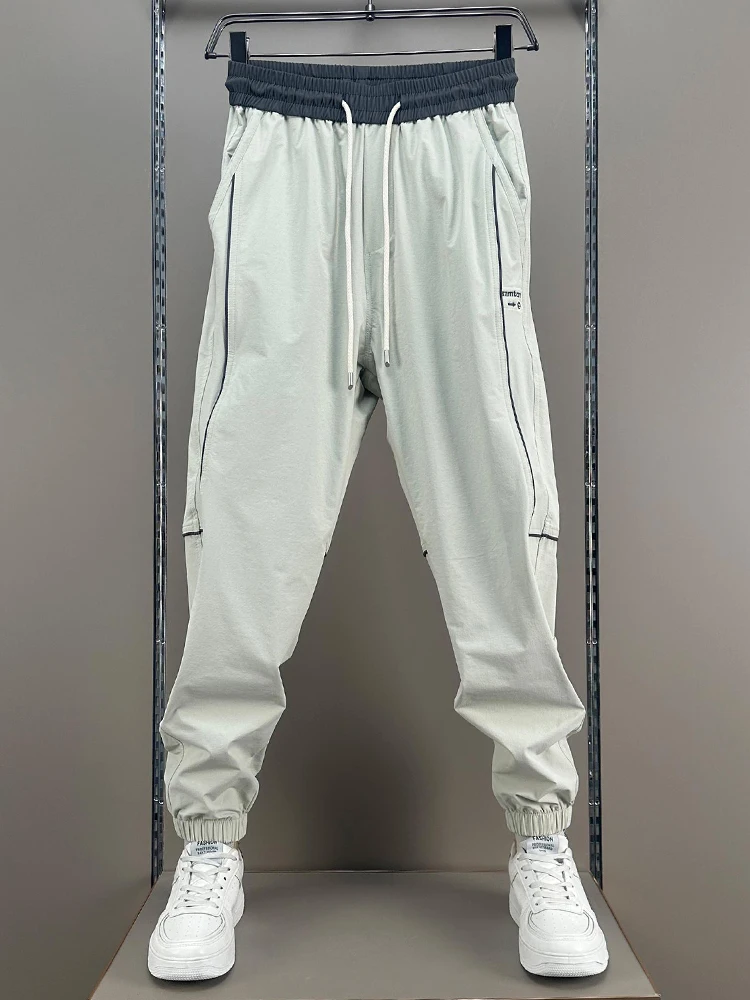 Men's Summer Thin Casual Pants Fashion Design Color Block Loose Breathable Sports Sweatpants Elastic Waist Cargo Trousers
Men's Summer Thin Casual Pants Fashion Design Color Block Loose Breathable Sports Sweatpants Elastic Waist Cargo Trousers