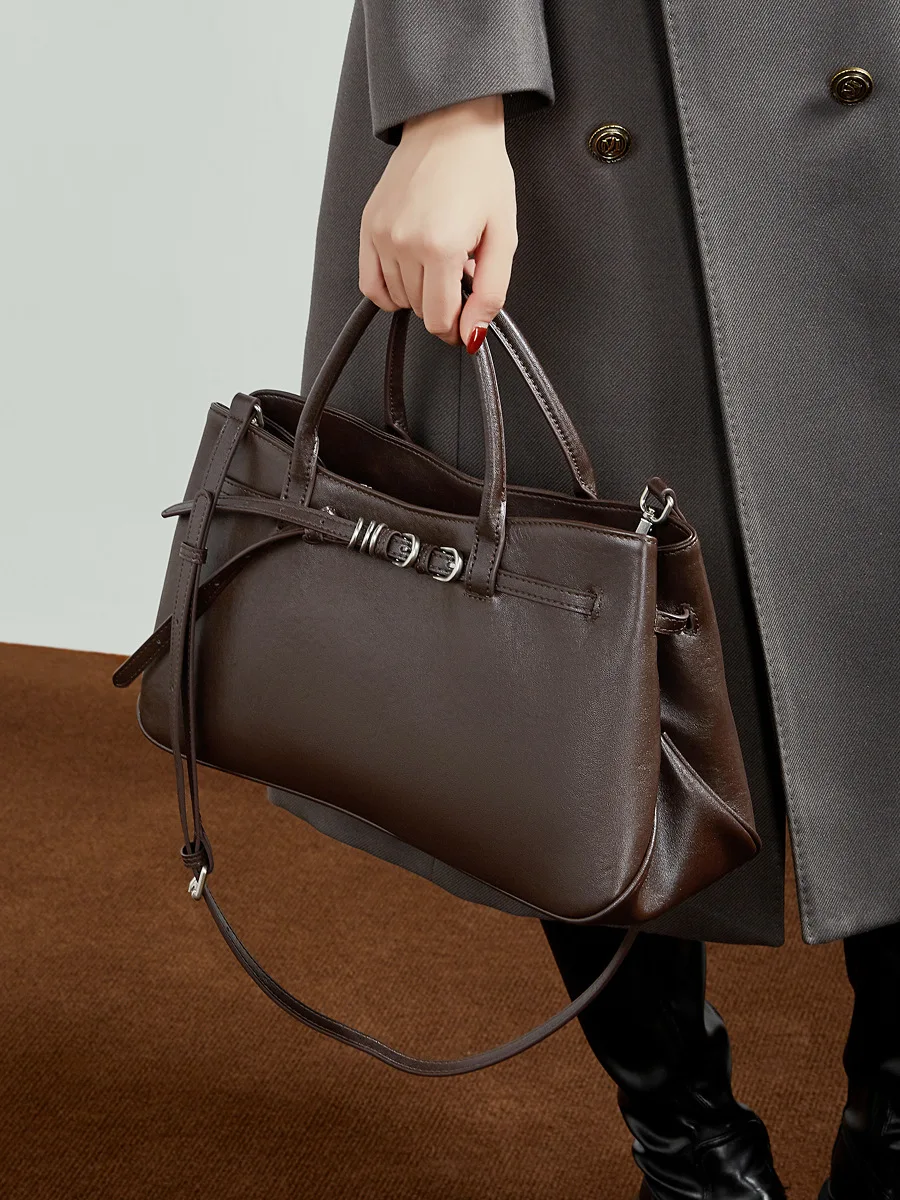 Genuine Leather Niche Handbag for Women, New Vintage Vegetable-Tanned Cowhide, Simple Belt Buckle Briefcase, Shoulder and Crossbody Bag
Genuine Leather Niche Handbag for Women, New Vintage Vegetable-Tanned Cowhide, Simple Belt Buckle Briefcase, Shoulder and Crossbody Bag