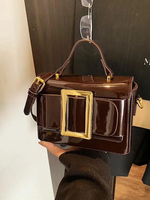 Classic Vintage Patent Leather Top-Handle Bag, Trendy Versatile Crossbody Satchel with Large Gold Buckle & Adjustable Strap
Classic Vintage Patent Leather Top-Handle Bag, Trendy Versatile Crossbody Satchel with Large Gold Buckle & Adjustable Strap