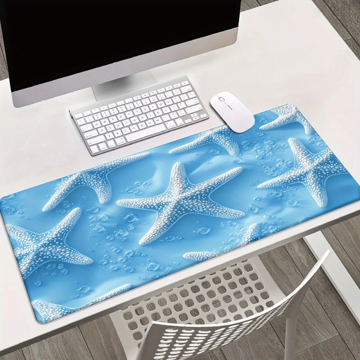Starfish pattern designed mouse pad, anti-slip rubber base, blue ocean-themed game and office large-sized computer accessory
Starfish pattern designed mouse pad, anti-slip rubber base, blue ocean-themed game and office large-sized computer accessory