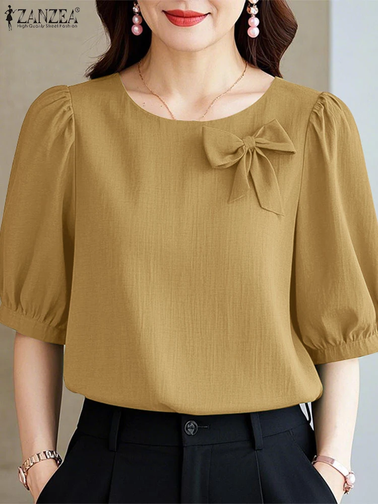 Elegant Women Work OL Blouses 2025 ZANZEA Summer Short Puff Sleeve Shirt Stylish Solid Holiday Tunic Tops Casual O Neck Blusas
Elegant Women Work OL Blouses 2025 ZANZEA Summer Short Puff Sleeve Shirt Stylish Solid Holiday Tunic Tops Casual O Neck Blusas