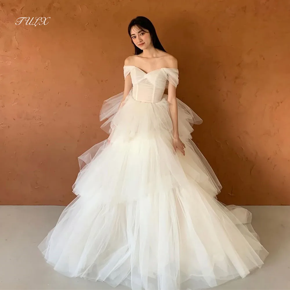 TULX Elegant Ivory Organza Wedding Dress Korea Photo Shoot V Neck Off Shoulder Bridal Gowns A line Long Tiered Corset Customized
TULX Elegant Ivory Organza Wedding Dress Korea Photo Shoot V Neck Off Shoulder Bridal Gowns A line Long Tiered Corset Customized