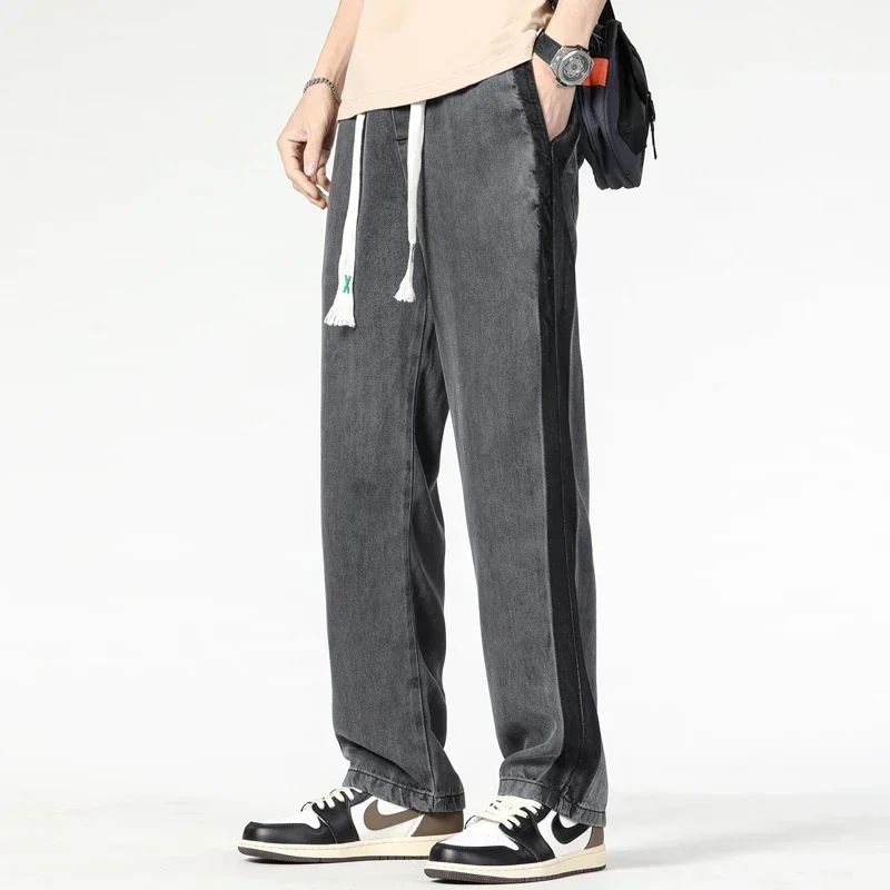 2025 Spring Summer Soft Lyocell Fabric Men's Jeans Thin Loose Straight Pants Drawstring Elastic Waist Korea Casual Trousers
2025 Spring Summer Soft Lyocell Fabric Men's Jeans Thin Loose Straight Pants Drawstring Elastic Waist Korea Casual Trousers