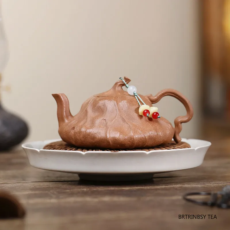 150ml Chinese Yixing Purple Clay Teapot Handmade Lotus Shape Tea Pot Beauty Tea Infuser Kettle Household Zisha Teaware Tea Set
150ml Chinese Yixing Purple Clay Teapot Handmade Lotus Shape Tea Pot Beauty Tea Infuser Kettle Household Zisha Teaware Tea Set