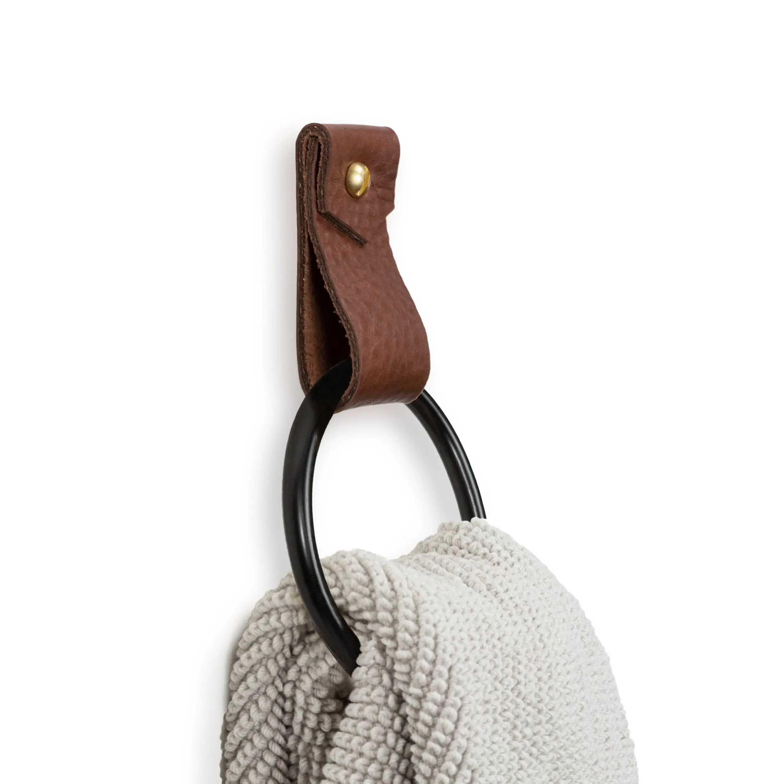 Brown Leather Wall-Mounted Hook With Black Circular Ring For Towels And Small Accessories In Contemporary Bathrooms
Brown Leather Wall-Mounted Hook With Black Circular Ring For Towels And Small Accessories In Contemporary Bathrooms