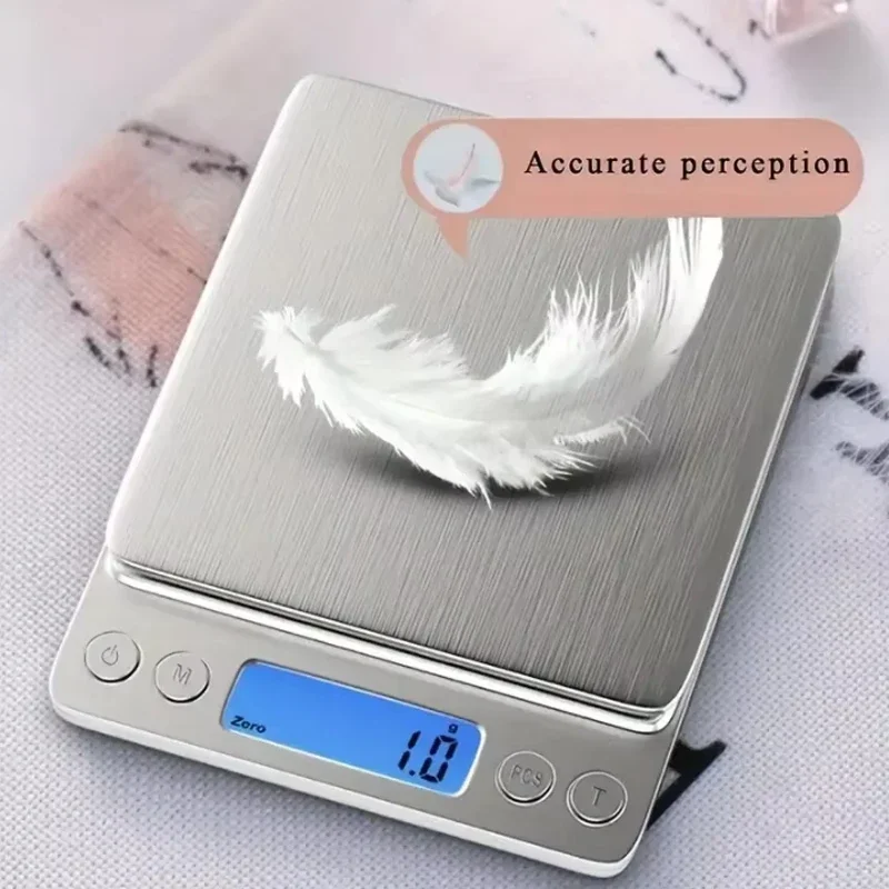 High precision jewelry scale Mini electronic pocket weighing portable household kitchen scale food weighing precision Gram scale
High precision jewelry scale Mini electronic pocket weighing portable household kitchen scale food weighing precision Gram scale
