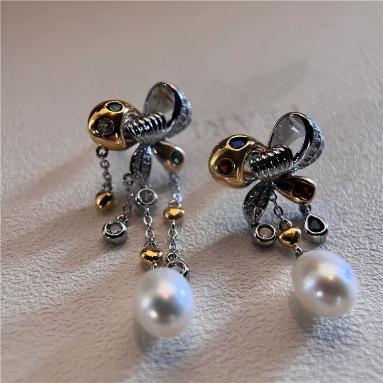 Freshwater White Pearl Colour Cz Paved Dangle Earrings
Freshwater White Pearl Colour Cz Paved Dangle Earrings