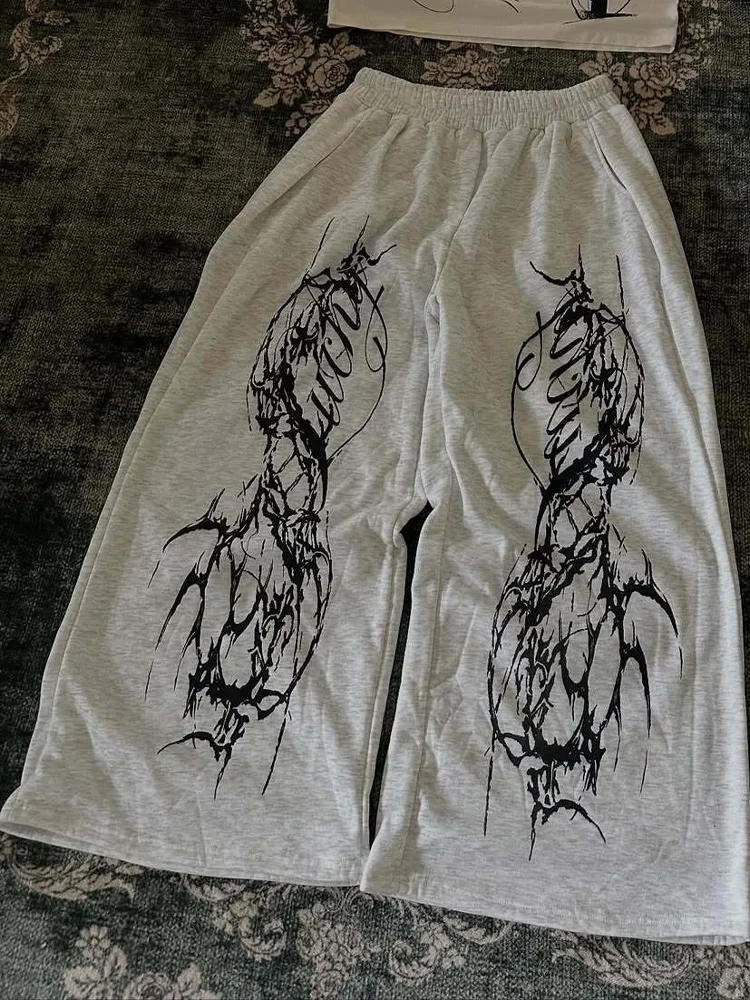 Dark punk style new Y2K dark goth print loose slimming men's and women's lace up sports pants wide leg sweatpants
Dark punk style new Y2K dark goth print loose slimming men's and women's lace up sports pants wide leg sweatpants