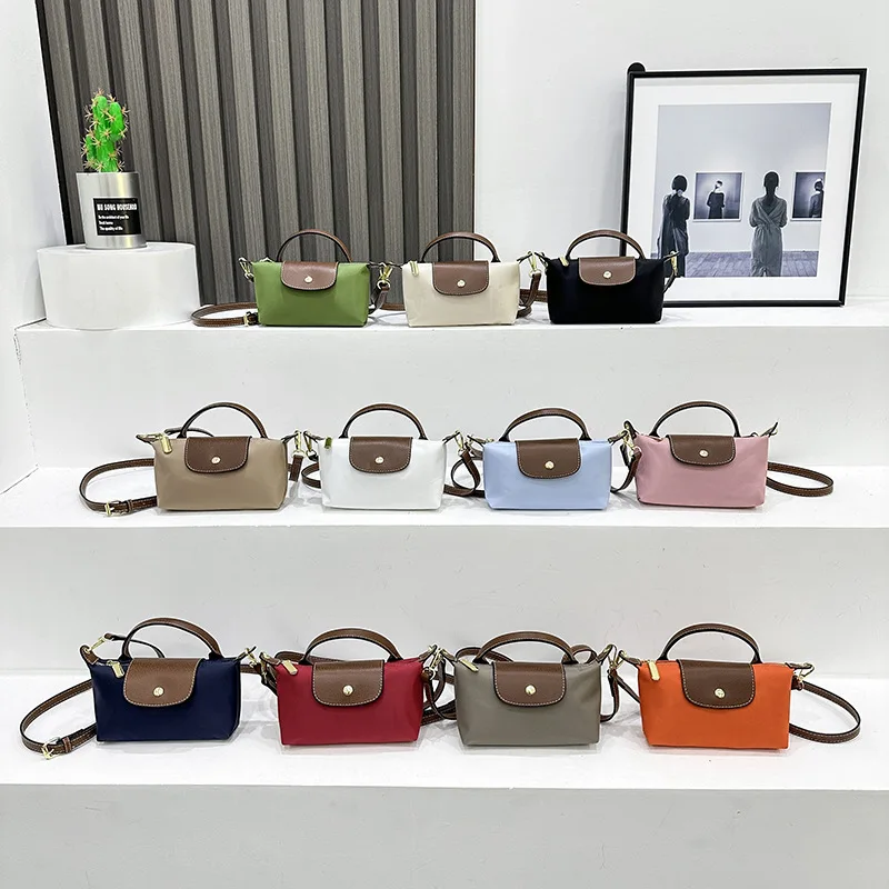 2024 Autumn/Winter Hot Bag Women's New Nylon Dumpling Bag Versatile Crossbody Canvas Handbag
2024 Autumn/Winter Hot Bag Women's New Nylon Dumpling Bag Versatile Crossbody Canvas Handbag