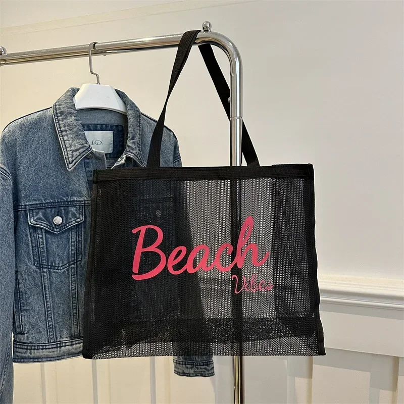 Gauze mesh handbag transparent shopping bag swimming bag nylon mesh dance fitness letter large capacity beach bag
Gauze mesh handbag transparent shopping bag swimming bag nylon mesh dance fitness letter large capacity beach bag