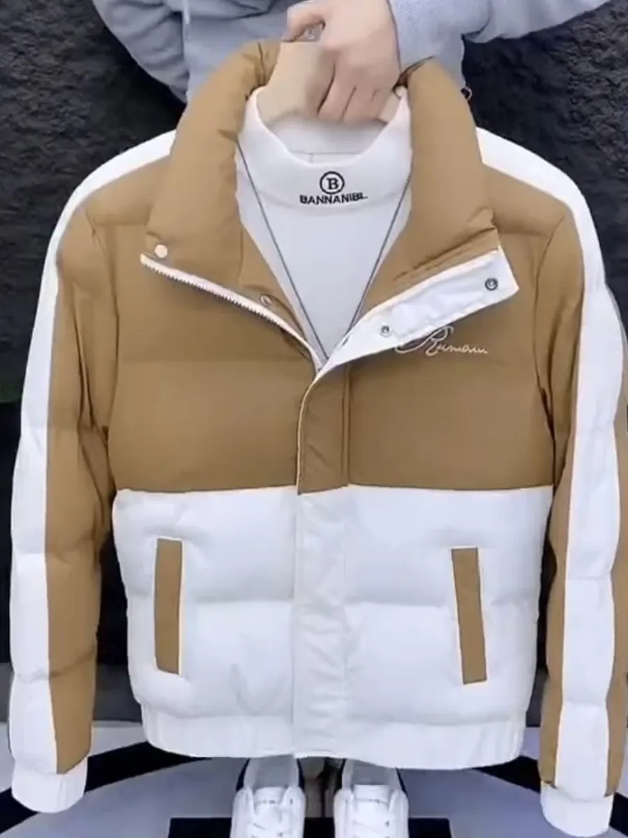 New Men's down Cotton Jaet Patchwork Sle Winter Warm Stand Collar Slim Fit Faion Thiened Korean Version Coat
New Men's down Cotton Jaet Patchwork Sle Winter Warm Stand Collar Slim Fit Faion Thiened Korean Version Coat