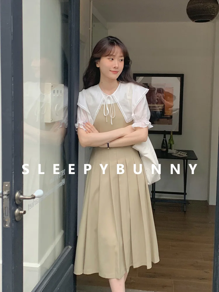 Preppy Style Pleated Suspender Dress Women High Waist Midi Pinafore Dress Sleeveless A-Line Jumper Outfit for Girls Summer Look
Preppy Style Pleated Suspender Dress Women High Waist Midi Pinafore Dress Sleeveless A-Line Jumper Outfit for Girls Summer Look