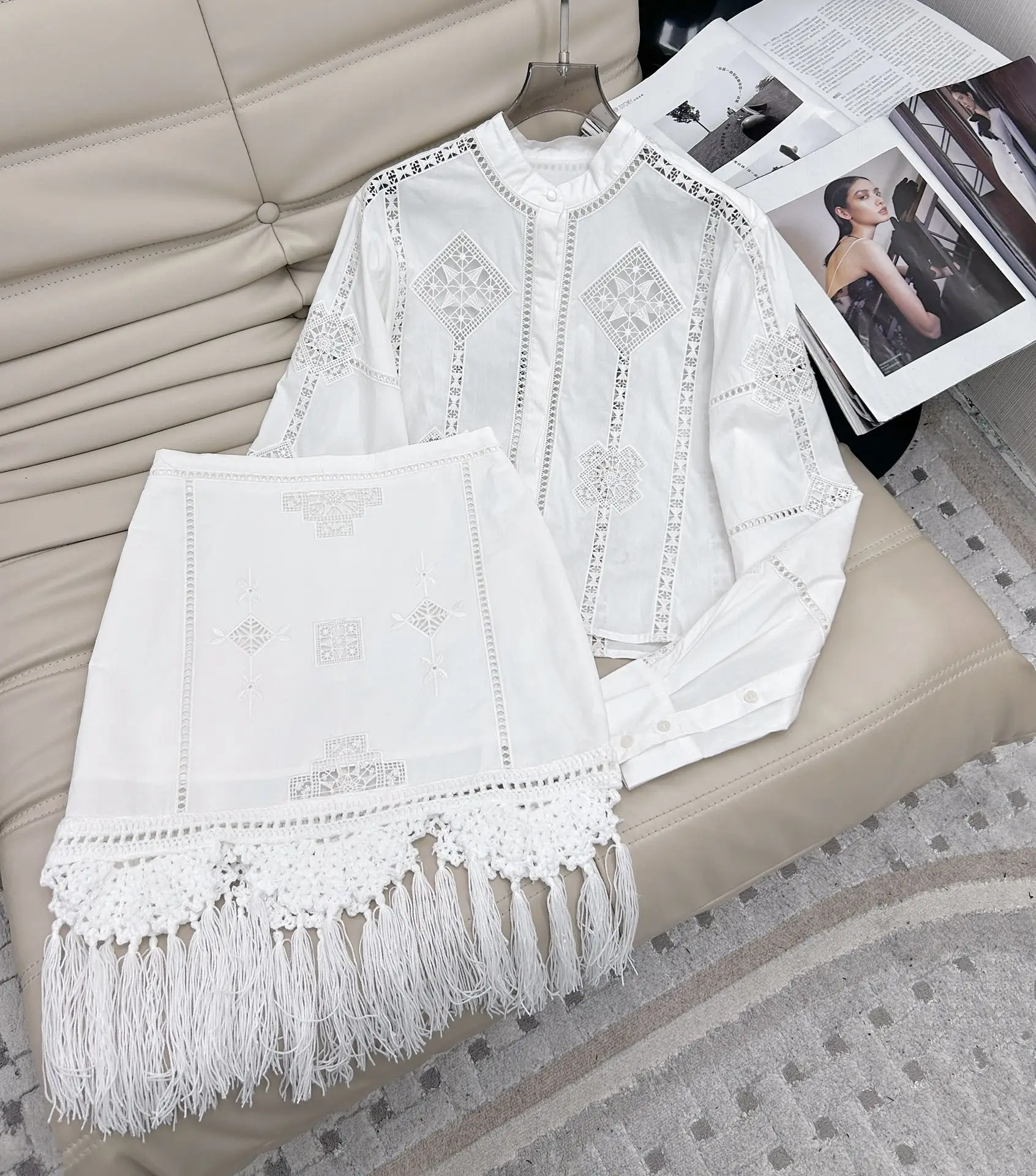 2025 spring and summer new women's fashion suit embroidered hollow top + high waist fringed skirt two-piece set 0224
2025 spring and summer new women's fashion suit embroidered hollow top + high waist fringed skirt two-piece set 0224