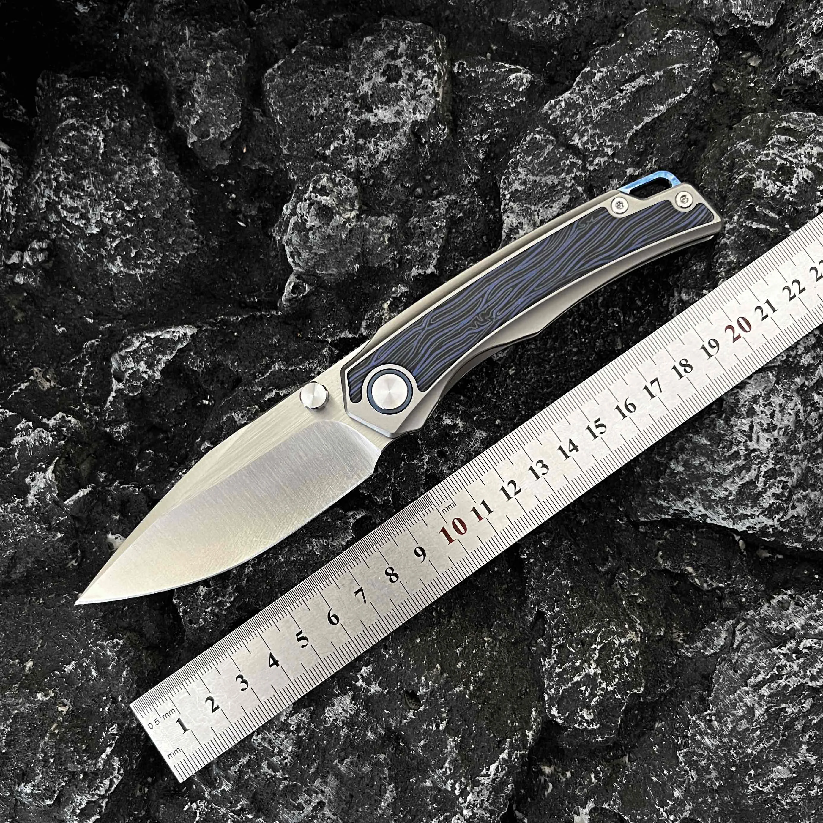 Новый складной нож M390 Steel G10 с ручкой из титанового сплава для поверхностного монтажа, тактика выживания для кемпинга, карманный нож EDC
Новый складной нож M390 Steel G10 с ручкой из титанового сплава для поверхностного монтажа, тактика выживания для кемпинга, карманный нож EDC