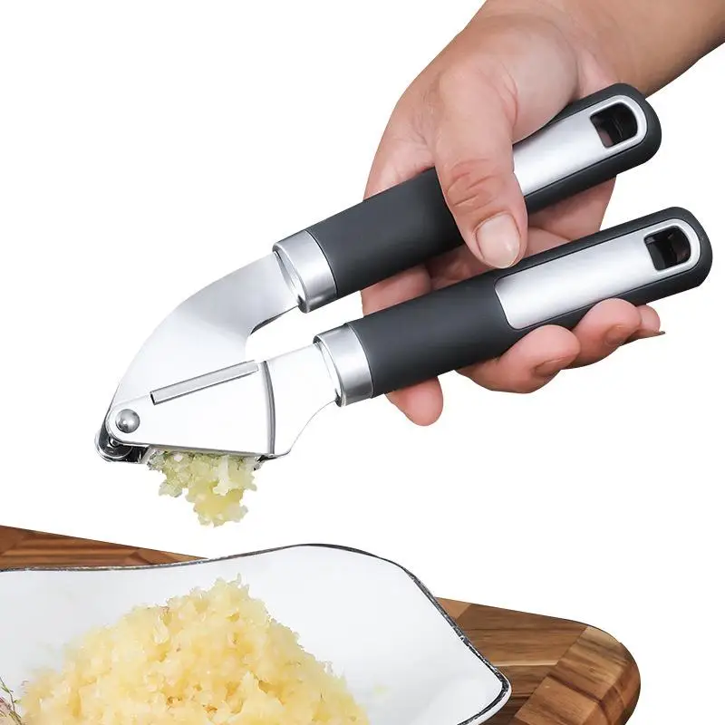Stainless Steel Manual Garlic Press Kitchen Tool for Home Use Easy to Clean Durable Garlic Smasher Garlic Paste Maker
Stainless Steel Manual Garlic Press Kitchen Tool for Home Use Easy to Clean Durable Garlic Smasher Garlic Paste Maker