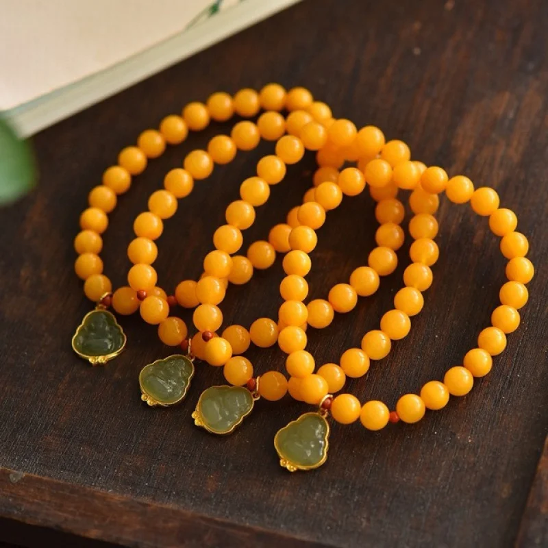 Natural Bracelet Full with Hetian Jade Buddha Pendant Chicken Fat Yellow Old Amber
Natural Bracelet Full with Hetian Jade Buddha Pendant Chicken Fat Yellow Old Amber