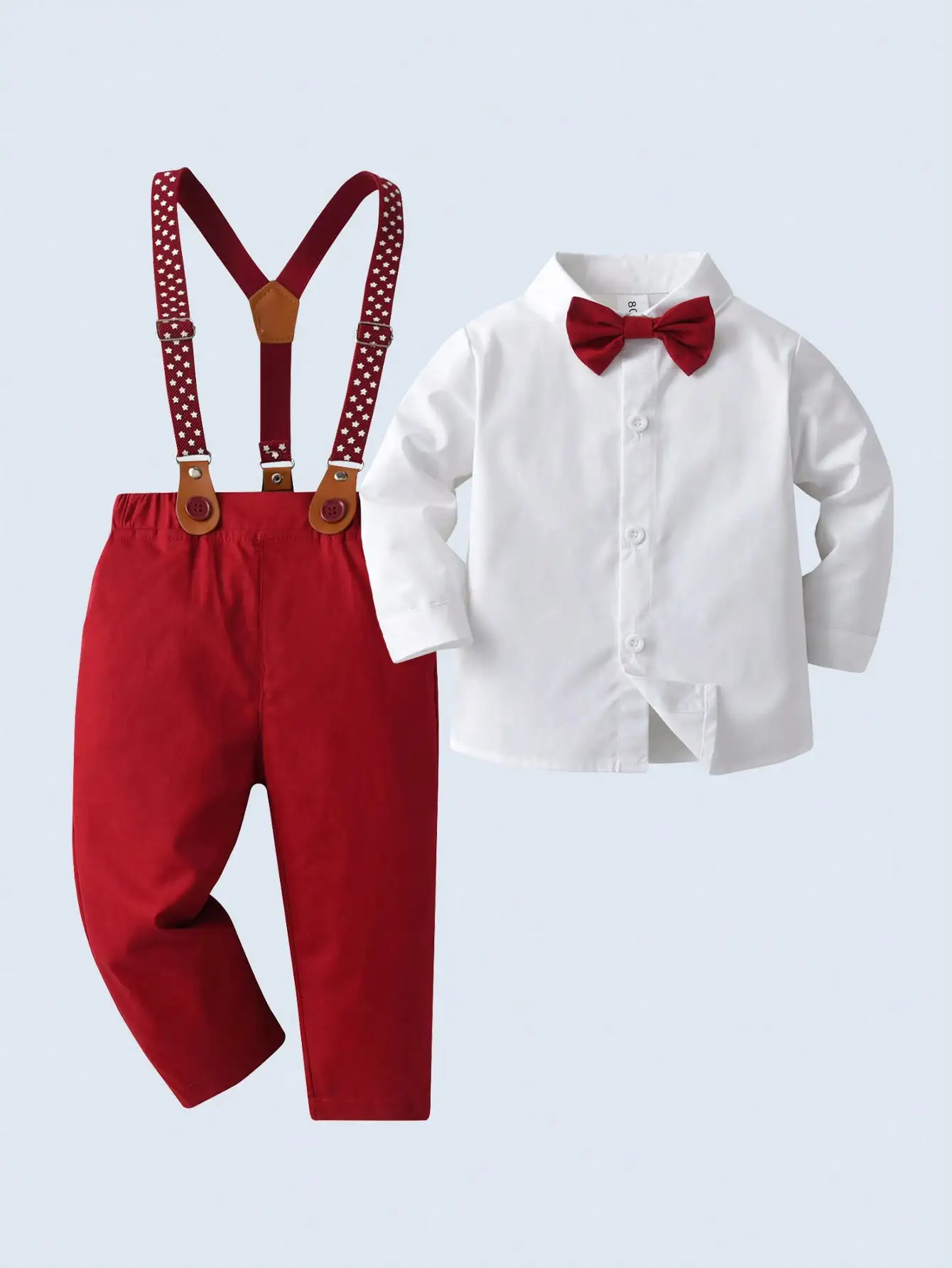 2-Piece Toddler Boy Formal Outfit: White Long Sleeve Shirt with Red Bow Tie & Star-Print Suspenders
2-Piece Toddler Boy Formal Outfit: White Long Sleeve Shirt with Red Bow Tie & Star-Print Suspenders