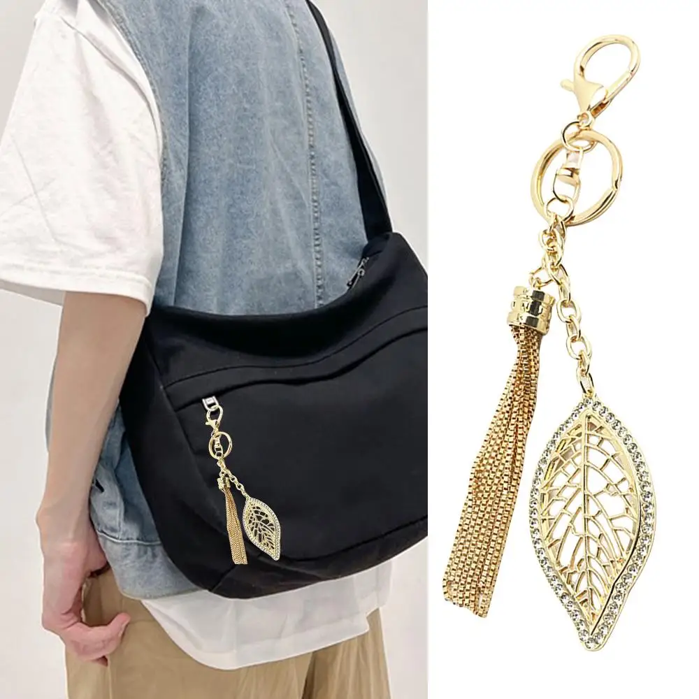 Leaf Shape Bag Pendant Tassel Chain Decorative Rhinestones Exquisite Bag Hardware Creative Bag Hanging Ornament With Buckle
Leaf Shape Bag Pendant Tassel Chain Decorative Rhinestones Exquisite Bag Hardware Creative Bag Hanging Ornament With Buckle