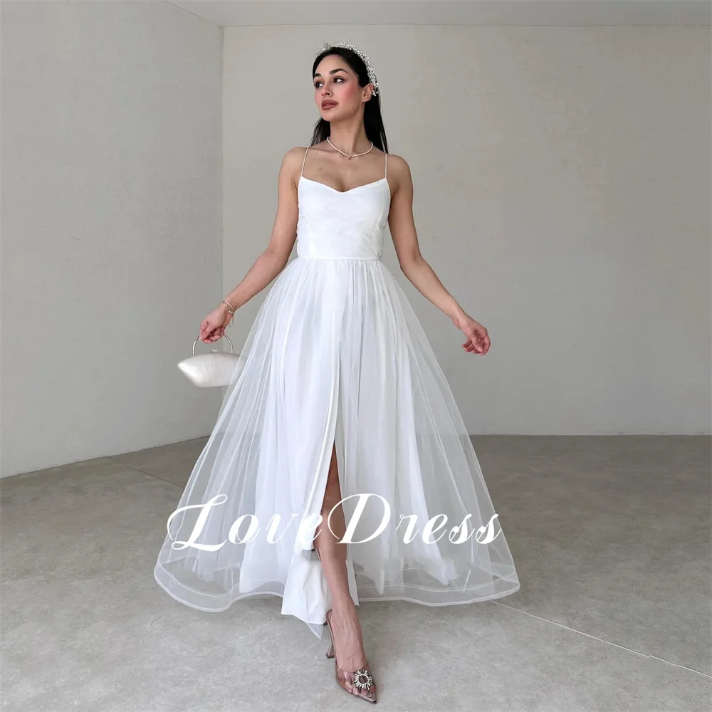 Love Elegant Tulle Perspective A-Line Spaghetti Strap Wedding Dress Simple V-Neck Sleeveless Ankle Length High Slit Customized
Love Elegant Tulle Perspective A-Line Spaghetti Strap Wedding Dress Simple V-Neck Sleeveless Ankle Length High Slit Customized
