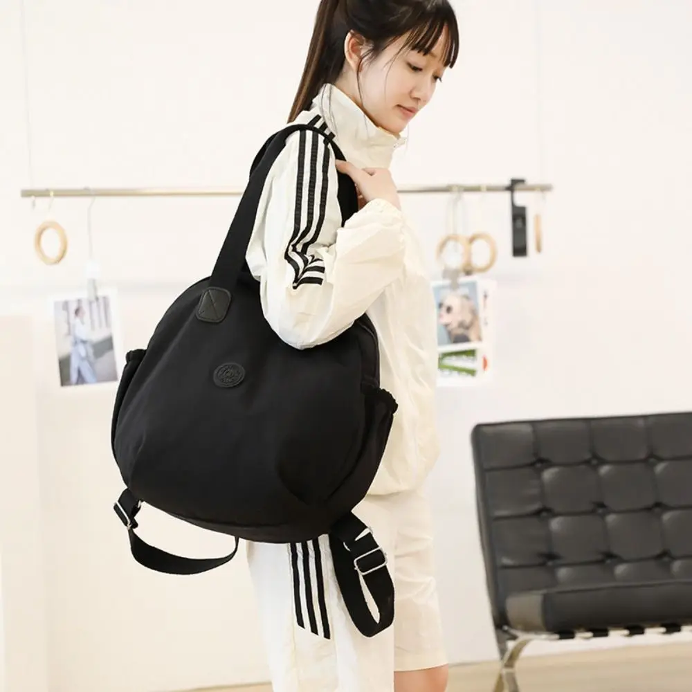 Корейский стильный нейлоновый рюкзак для плавания, большой вместимости, круглой формы, на одно плечо, нишевый дизайн, однотонный, для фитнеса, женский
Корейский стильный нейлоновый рюкзак для плавания, большой вместимости, круглой формы, на одно плечо, нишевый дизайн, однотонный, для фитнеса, женский