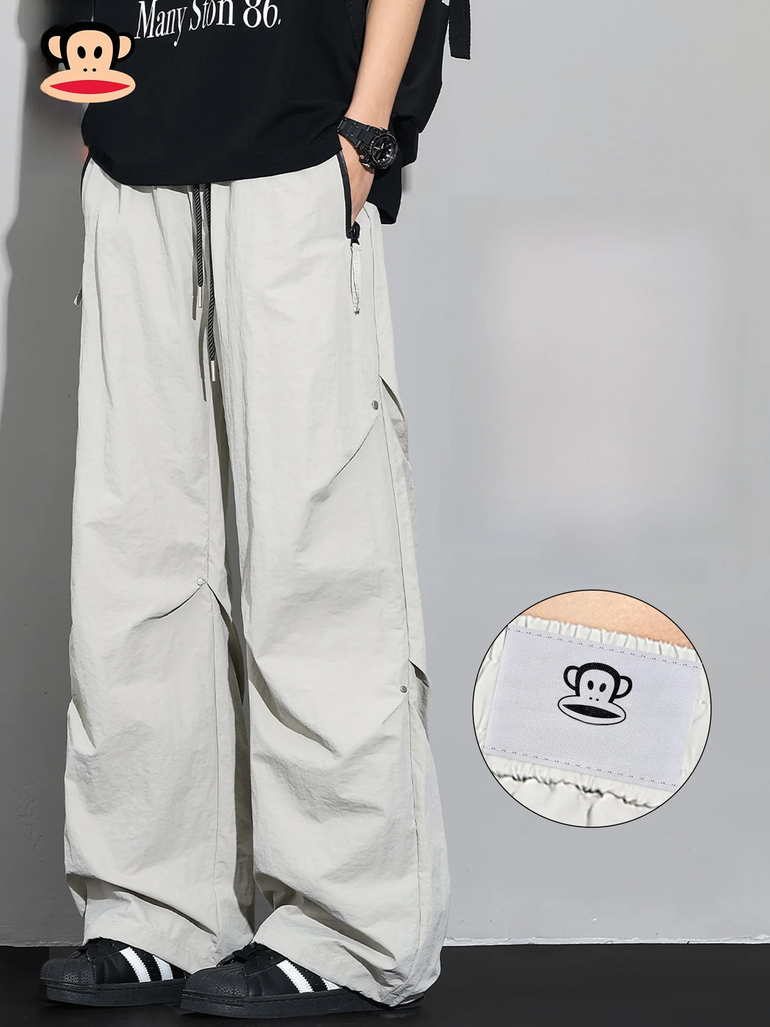 Новые весенние повседневные брюки Paul Frank в американском стиле для мужчин: свободные прямые брюки-карго из нейлона для молодежи
Новые весенние повседневные брюки Paul Frank в американском стиле для мужчин: свободные прямые брюки-карго из нейлона для молодежи