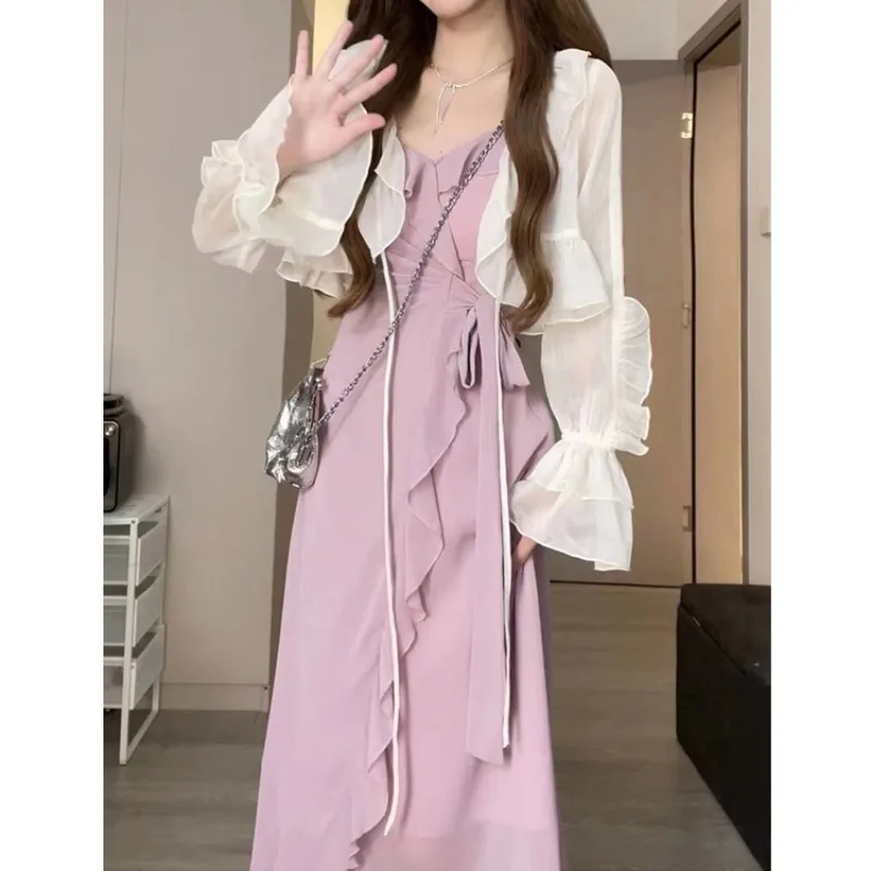 Ruffled thin cardigan over a pure desire ruffled V-neck maxi slip dress
Ruffled thin cardigan over a pure desire ruffled V-neck maxi slip dress