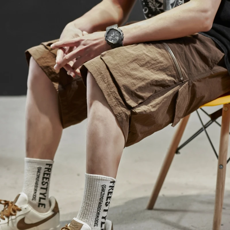 Summer Korean Hip Hop Zipper Pocket Functional Cargo Shorts Men Streetwear Outdoor Skateboard Pants Harajuku Baggy Shorts Male
Summer Korean Hip Hop Zipper Pocket Functional Cargo Shorts Men Streetwear Outdoor Skateboard Pants Harajuku Baggy Shorts Male