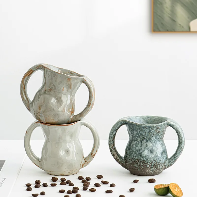 Креативная керамическая кофейная чашка в стиле ретро с двойными ушками, ручная работа, креативная грубая посуда, бытовая чашка для воды небольшой емкости
Креативная керамическая кофейная чашка в стиле ретро с двойными ушками, ручная работа, креативная грубая посуда, бытовая чашка для воды небольшой емкости
