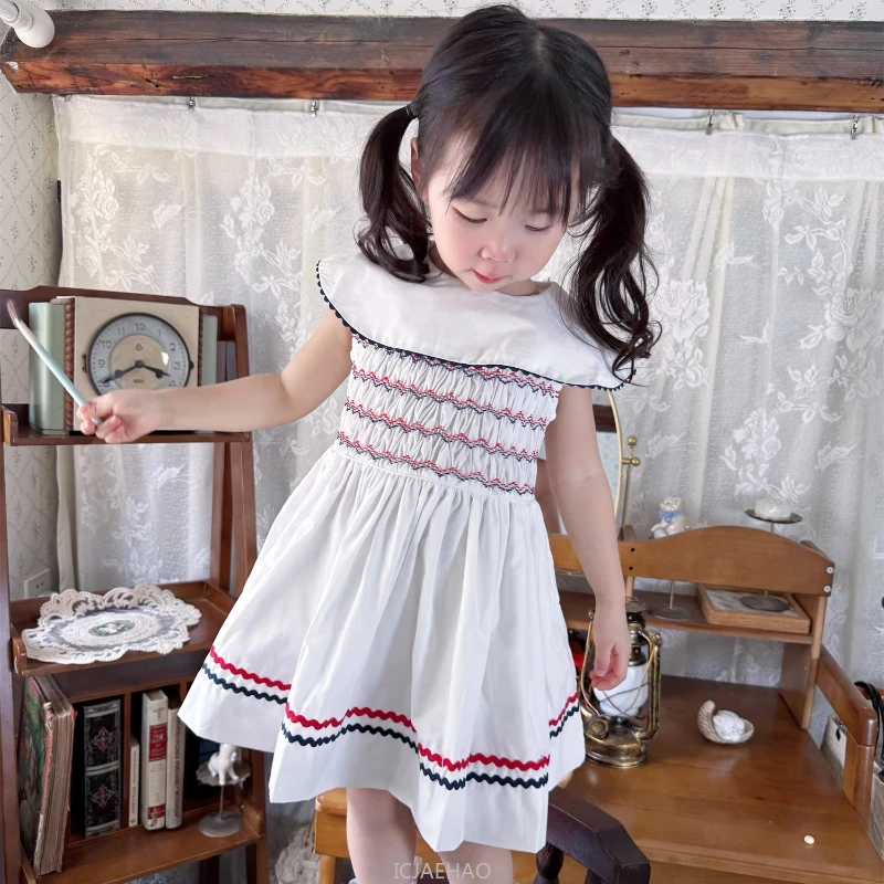 2025 Girls Vintage Navy Collar Hand Smocked Dress Kids Matching Summer Cotton Simple Style Casual Holiday Outfit Simple Wear
2025 Girls Vintage Navy Collar Hand Smocked Dress Kids Matching Summer Cotton Simple Style Casual Holiday Outfit Simple Wear